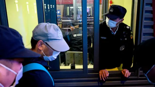 A security guard at the station