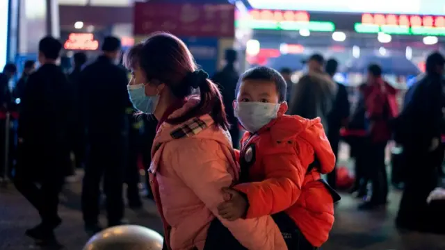 A woman and child at the railway station