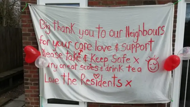 The banner outside the home