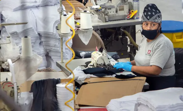 Sewing clothes in a garment factory