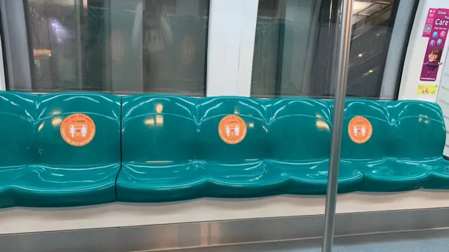 Empty seats on subway train