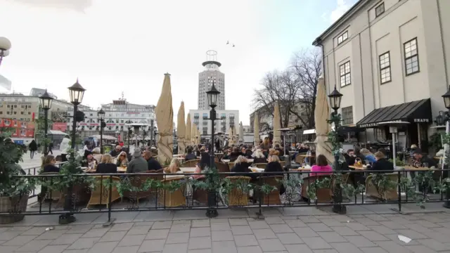 People eating at a restaurant in Stockholm in April