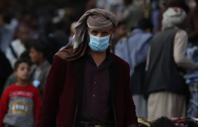 A Yemeni man wears a face mask in the capital Sanaa