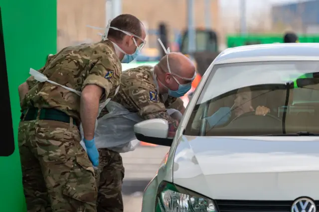 Soliders test NHS workers