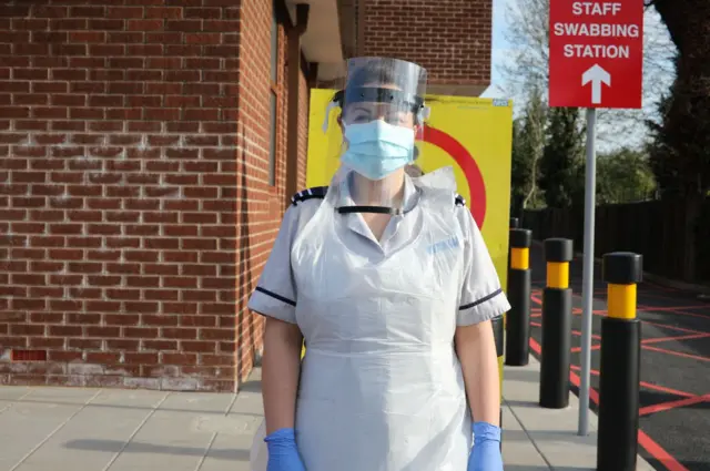 Nurse wearing visor