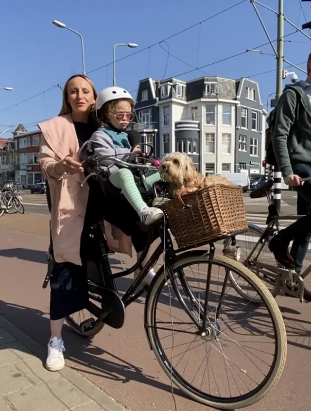 BBC reporter Anna Holligan with her daughter and dog