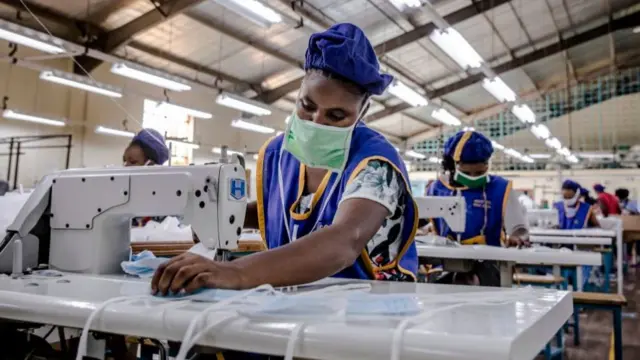 A worker produces face masks in Kitui, Kenya