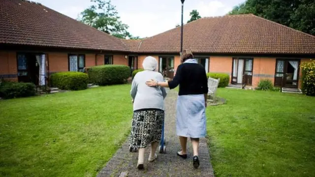 A carer with a resident