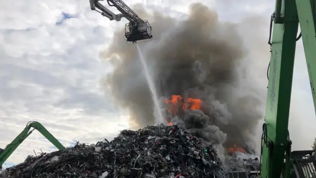 Firefighters fighting the blaze