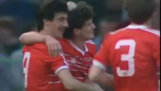 Ian Rush and Mark Hughes celebrate