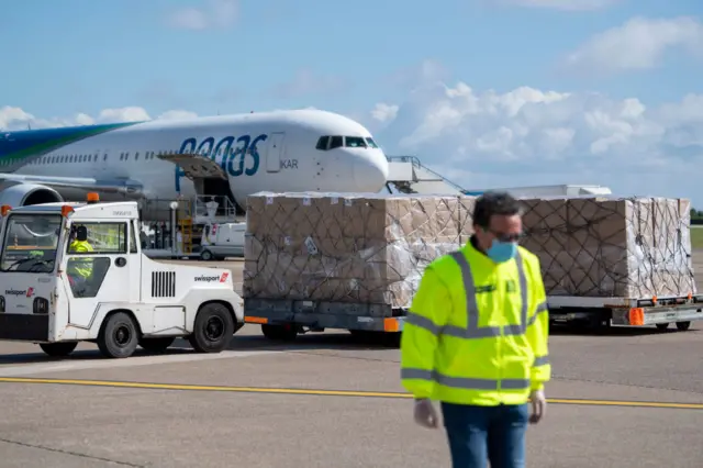 More than 460,000 fluid-resistant PPE gowns arrived in Cardiff airport earlier today