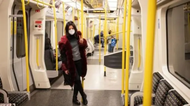 face mask on London underground