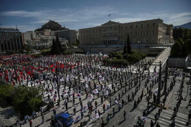 Members of the Greek Labour Union rally outside parliament in Athens, 1 May