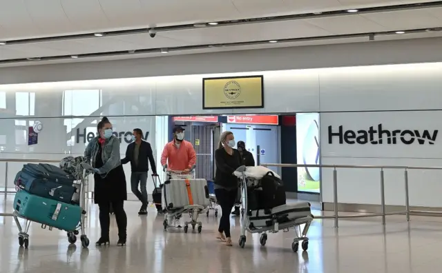 Passengers arriving at Heathrow Airport