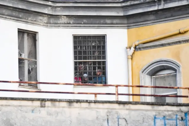 Inmates protest inside the Poggioreale prison in Naples, southern Italy, 01 April 2020