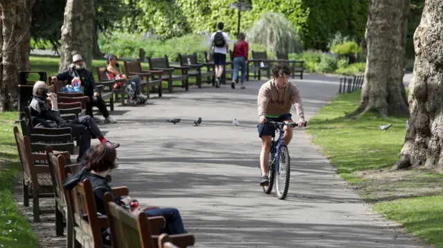 People in a park in Glasgow