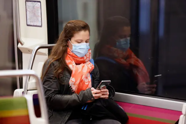 A commuter on the Paris metro