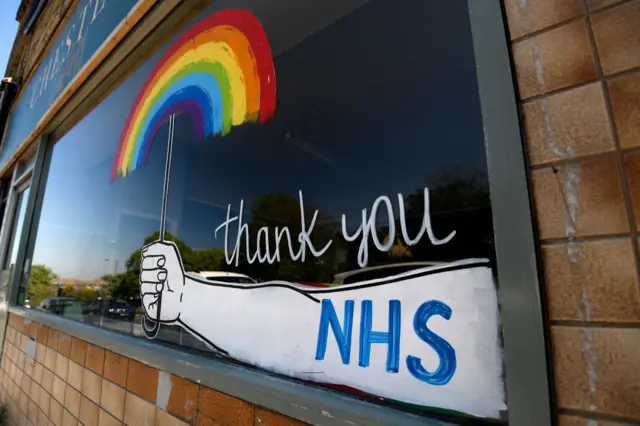 Rainbow painting in a cafe window