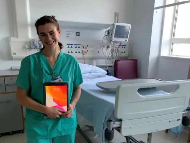 Nurse holding iPad