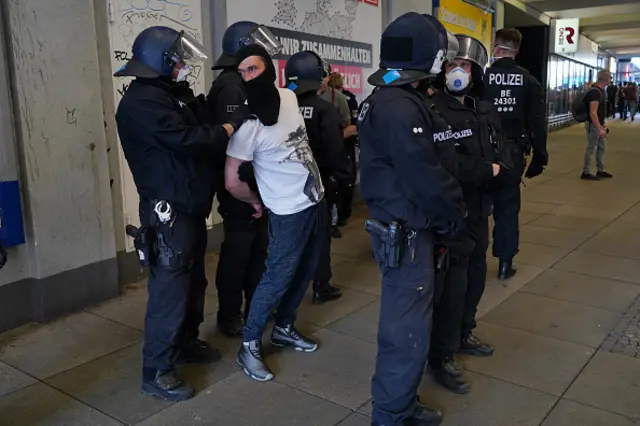 Lockdown protester with police in Germany