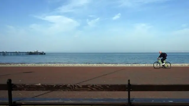 Man cycling in Llandudno