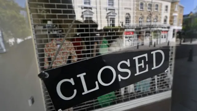 'Closed' sign at shop door