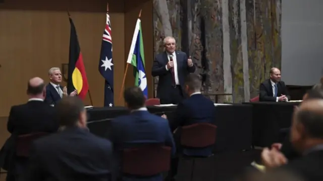 Scott Morrison addresses party members in Parliament's Great Hall