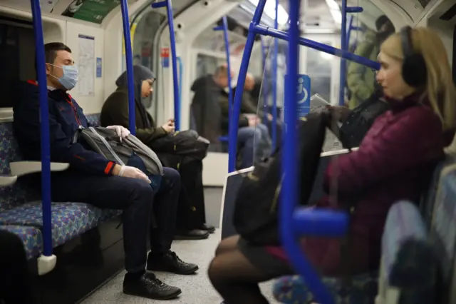 Commuters on the London Underground on Monday