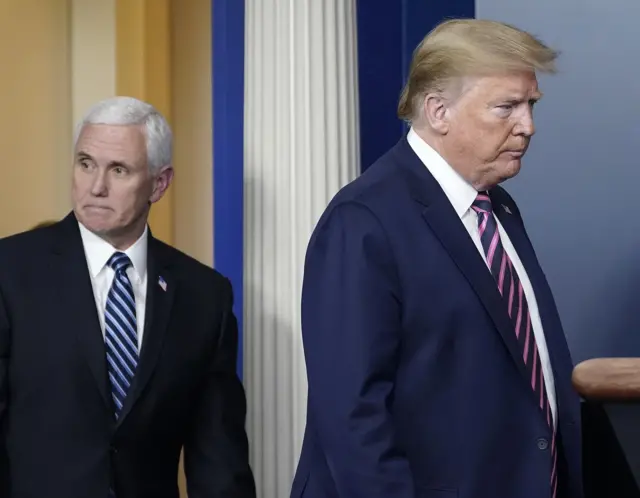 Pence and Trump at a White House briefing on 24 April