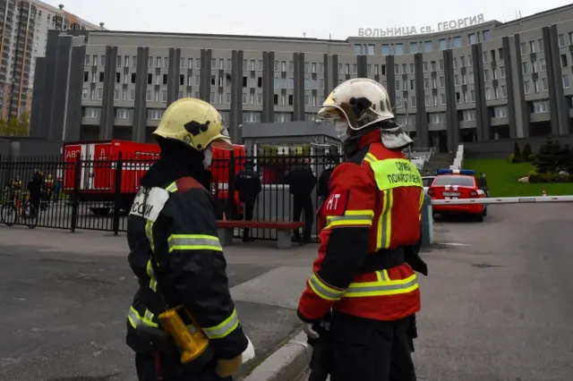 Firefighters at a hospital in St Petersburg after a fire in an intensive care unit, 12 May 2020