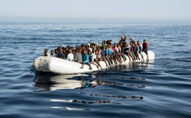 A dinghy carrying illegal immigrants in the Mediterranean. File photo