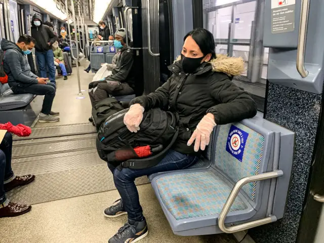 In the Paris metro, passengers respect physical distances and wear masks on 11 May 2020