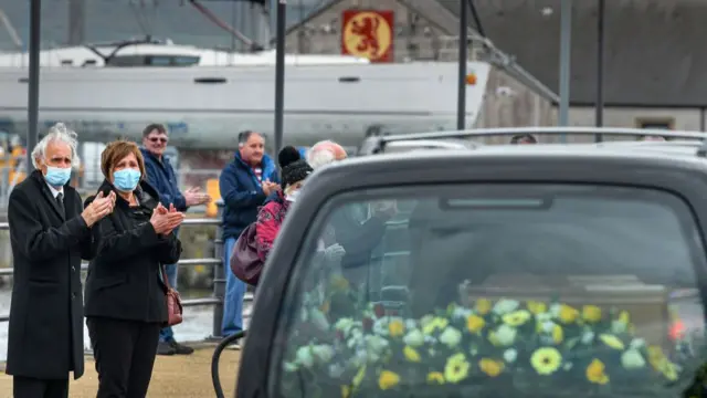 A funeral procession in Campbeltown, Scotland.