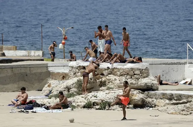 People sunbathe in Beirut