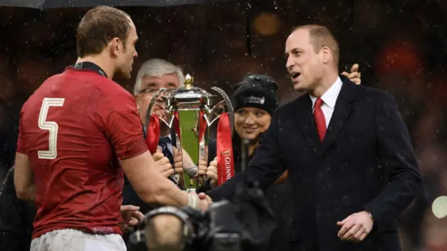 Prince William, the Duke of Cambridge, congratulates Wales captain Alun Wyn Jones on winning the 2019 Six Nations Grand Slam