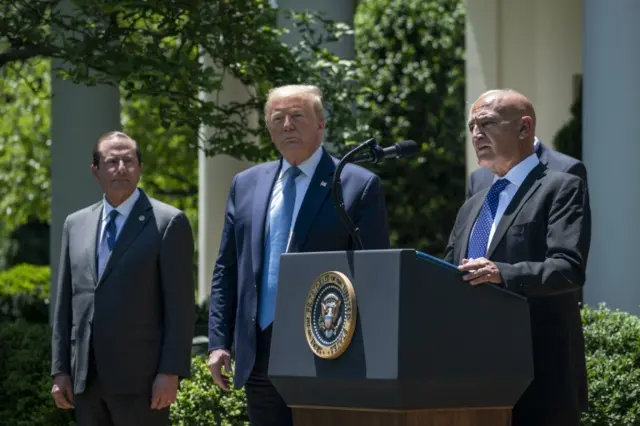 Health and Human Secretary Alex Azar, President Donald Trump and Moncef Slaoui, the former head of GlaxoSmithKlines vaccines division