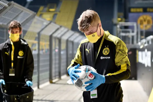 A football being disinfected