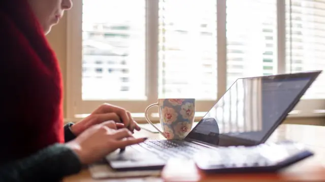 Woman working on laptop