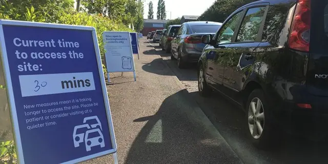 Cars queuing outside a recycling centre in Buckinghamshire