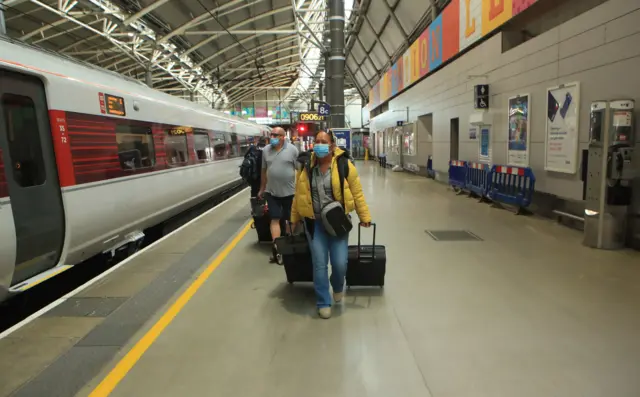 Travellers at Leeds station