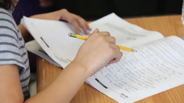 A student taking an exam