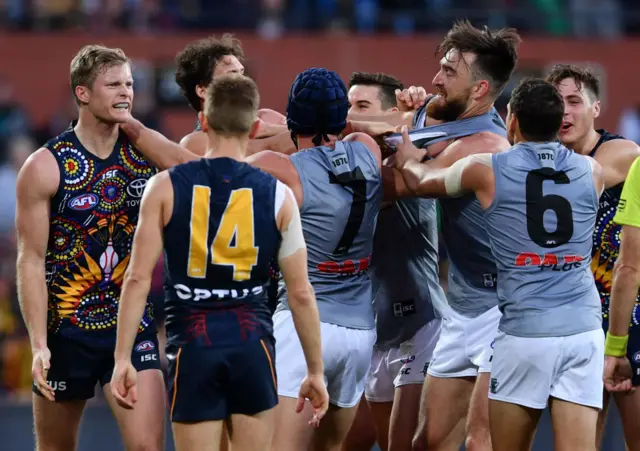 Port Adelaide and Adelaide clash