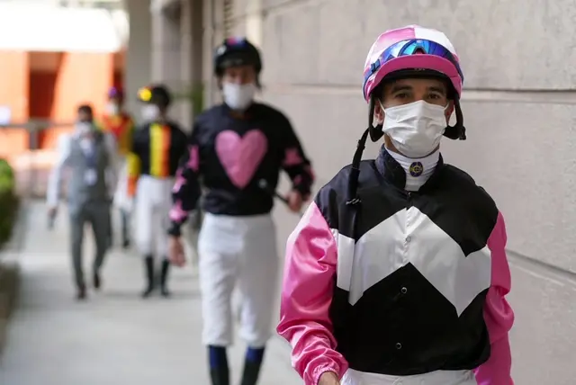 Jockeys in face masks