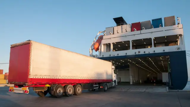 Lorry driving on to ferry