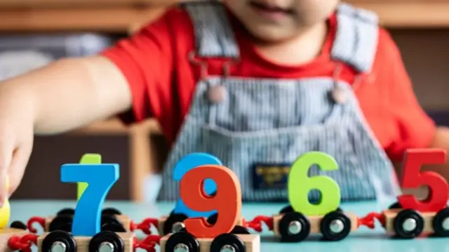 Child playing with toys