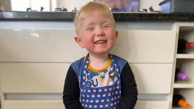 Child in a cooking apron