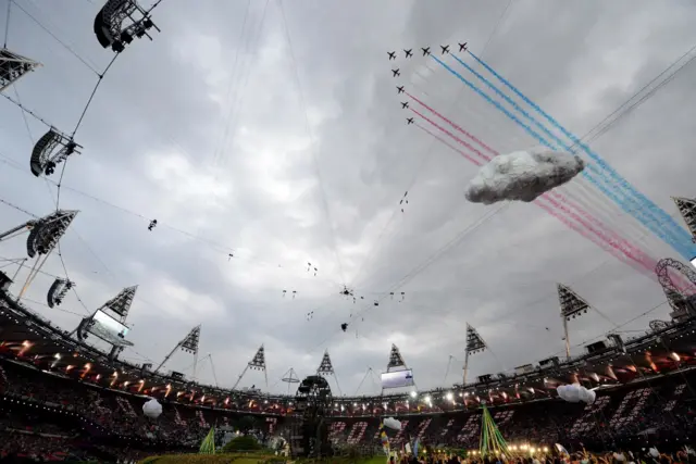 The Red Arrows fly past during the London Olympic Games 2012 Opening Ceremony