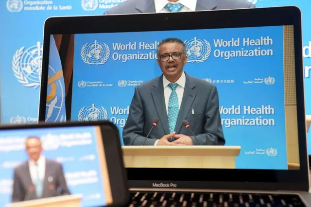 Tedros Adhanom Ghebreyesus seen on laptop screen