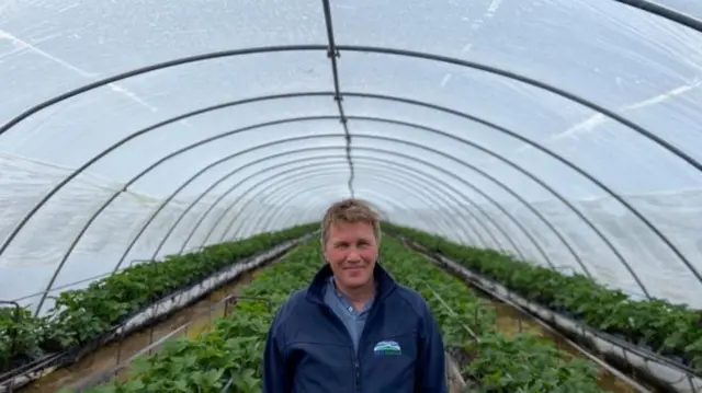 Scottish fruit farmer James Porter has said he needs to find hundreds of pickers