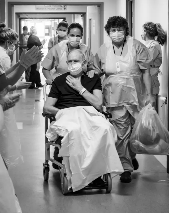 A coronavirus patient leaving hospital